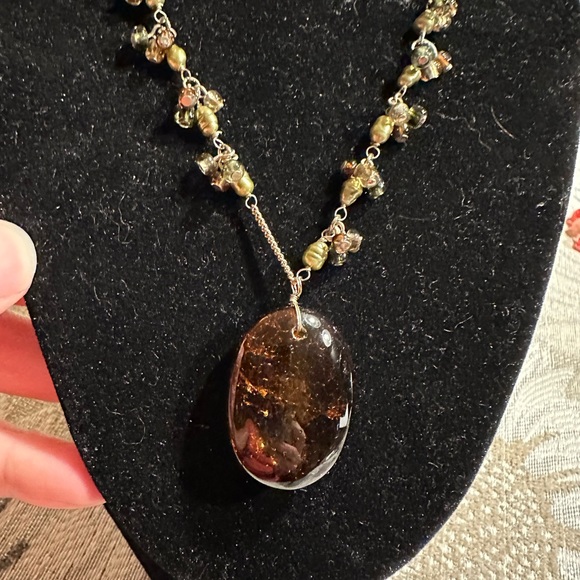 Beautiful amber stone hangs from chain with delicate clusters of small beads. - Picture 2 of 13